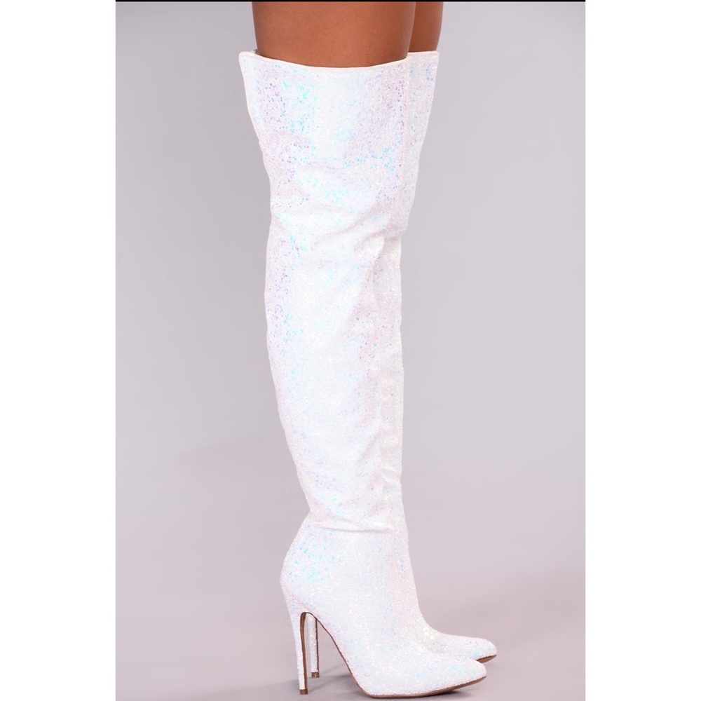 Knee high sparkly white boots